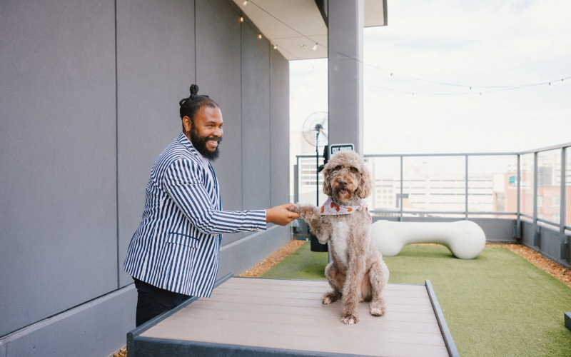 Man posing with dog