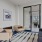 a living room with a glass door